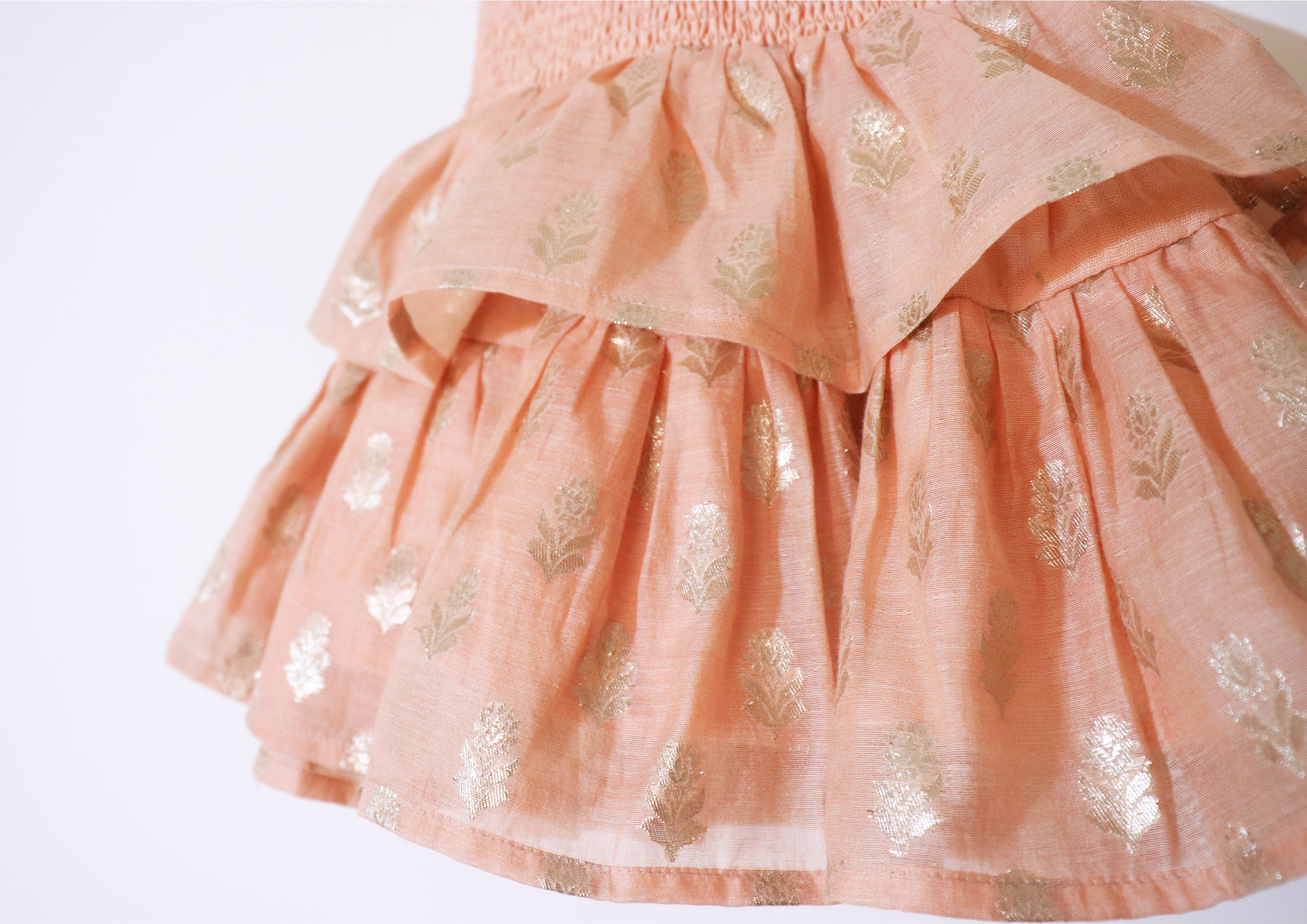 SnuggleMe Infant Girl Peach Smocking Frock with Zari Booti