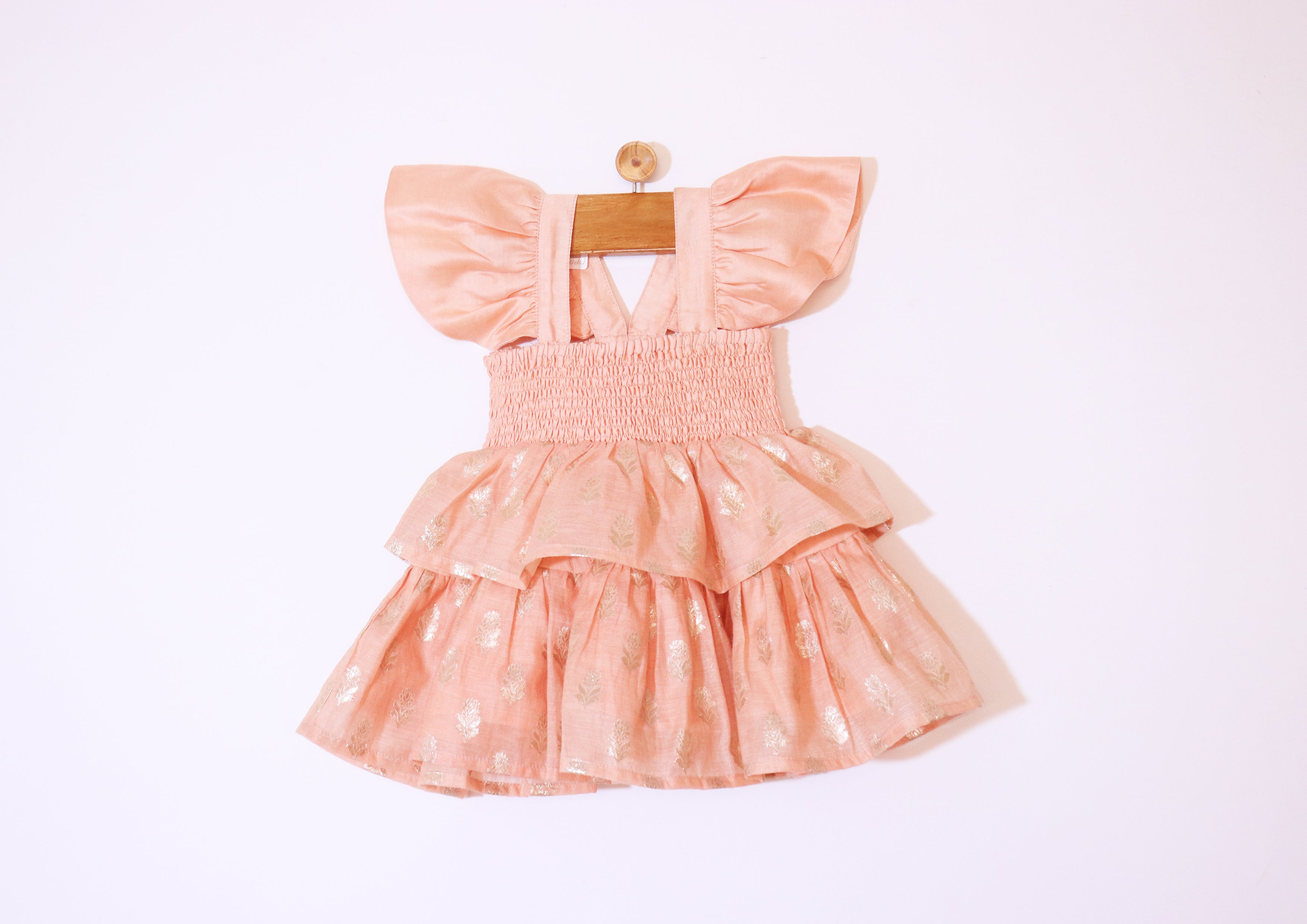 SnuggleMe Infant Girl Peach Smocking Frock with Zari Booti