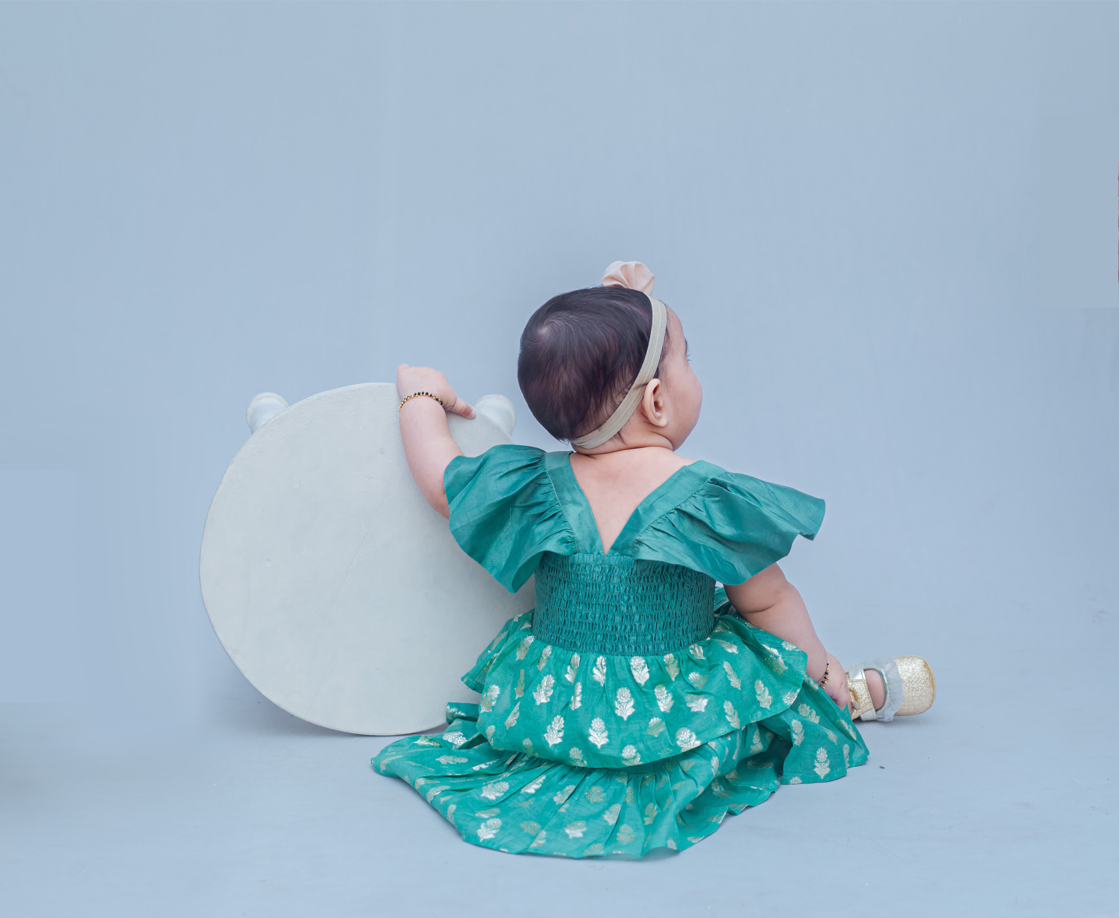 SnuggleMe Infant Girl Green Smocking Frock with Zari Booti