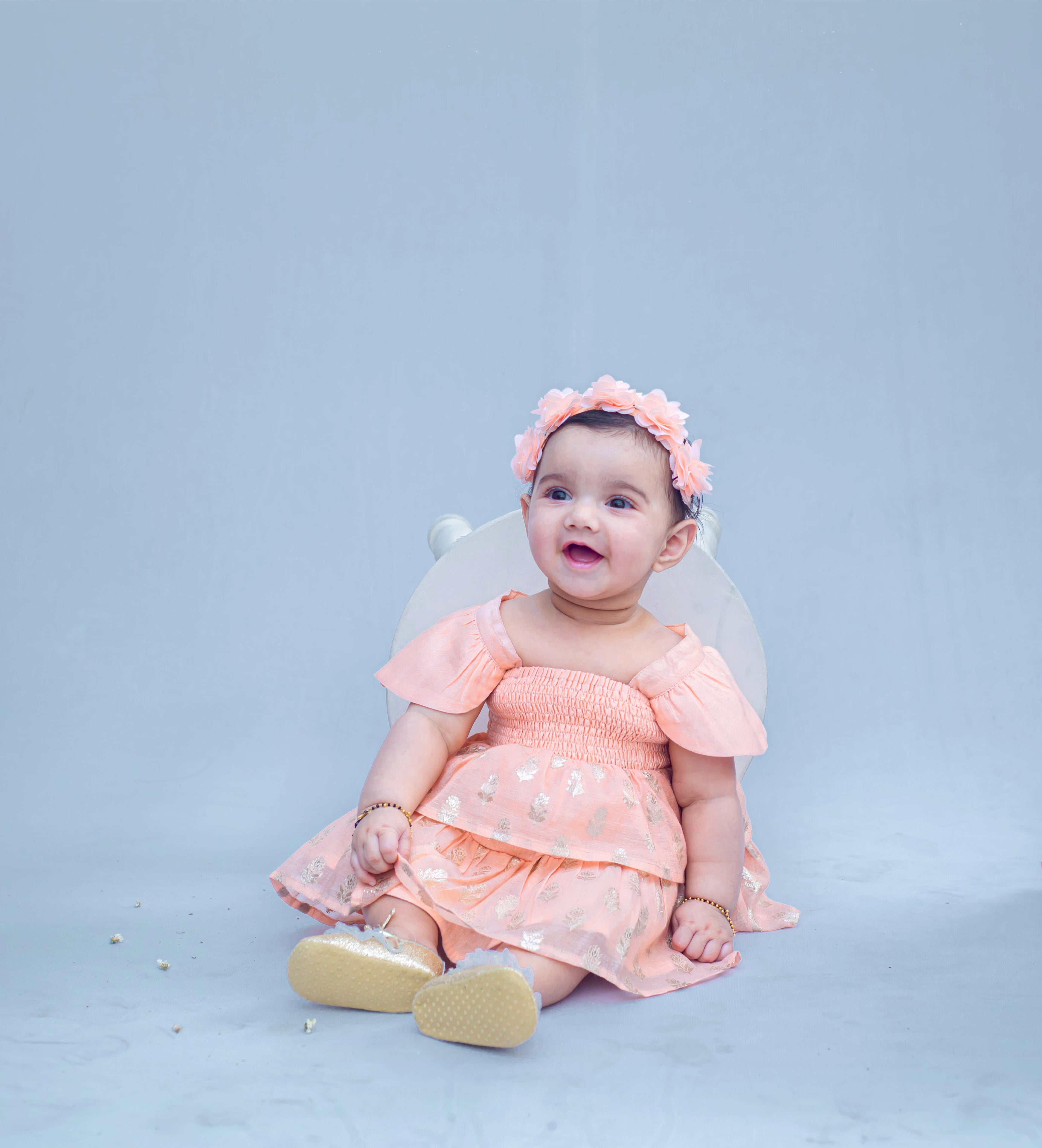 SnuggleMe Infant Girl Peach Smocking Frock with Zari Booti