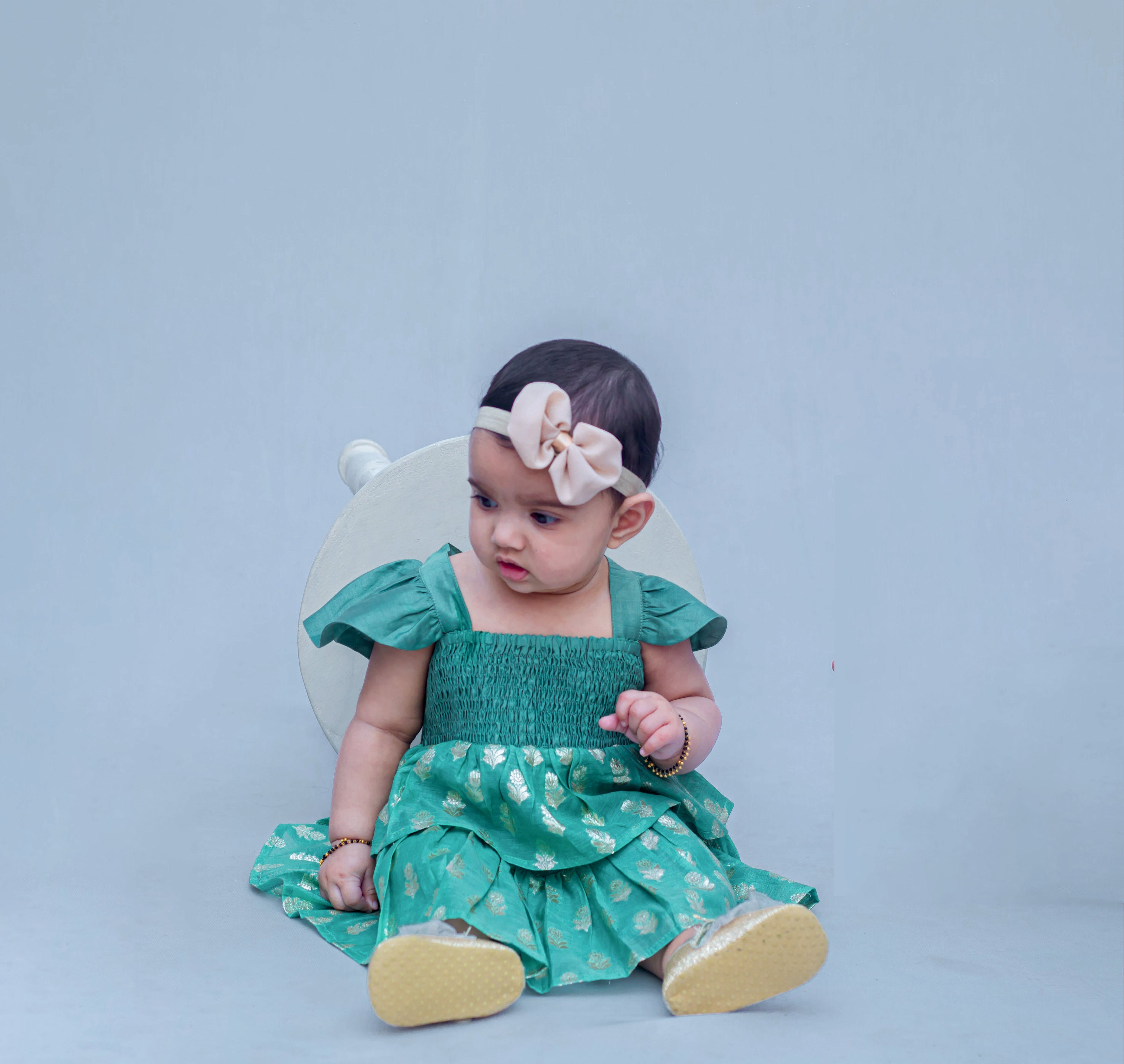 SnuggleMe Infant Girl Green Smocking Frock with Zari Booti
