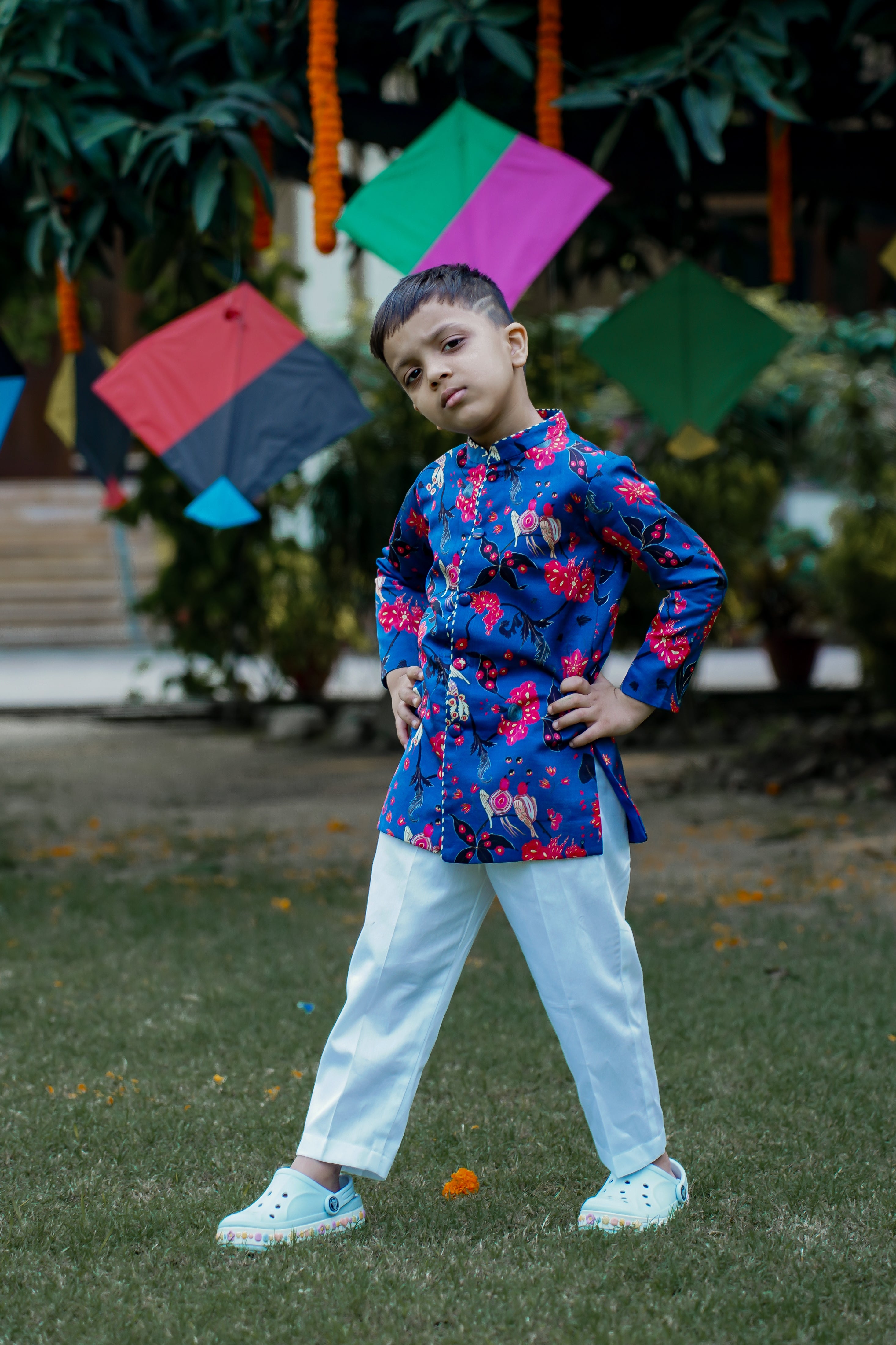 SnuggleMe boys' vibrant blue short sherwani in satin silk with white cotton trousers, perfect for weddings and festive occasions.