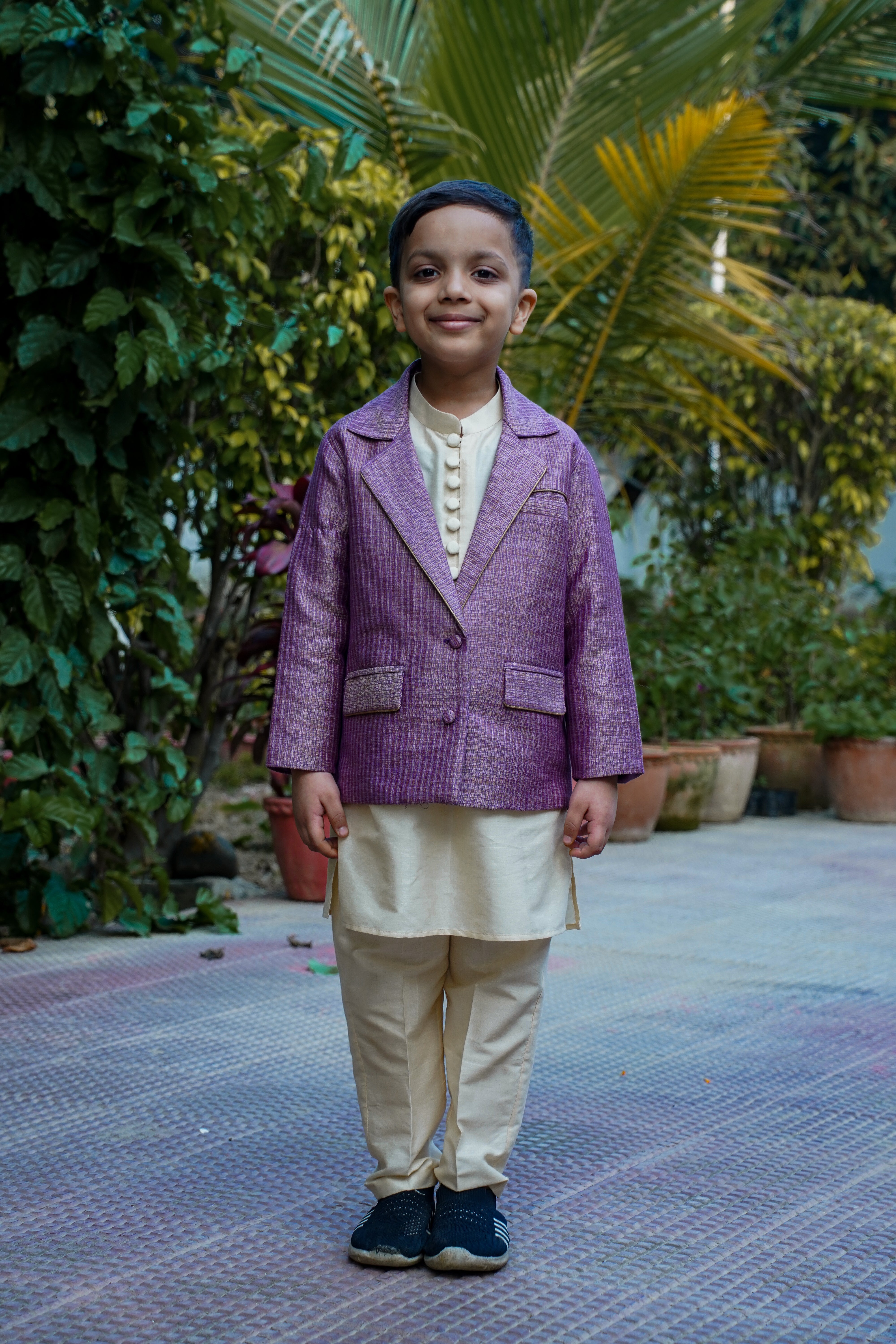 Kids' traditional coat on kurta pajama set, ideal for weddings and festive occasions, showcasing style and elegance in children's ethnic wear.