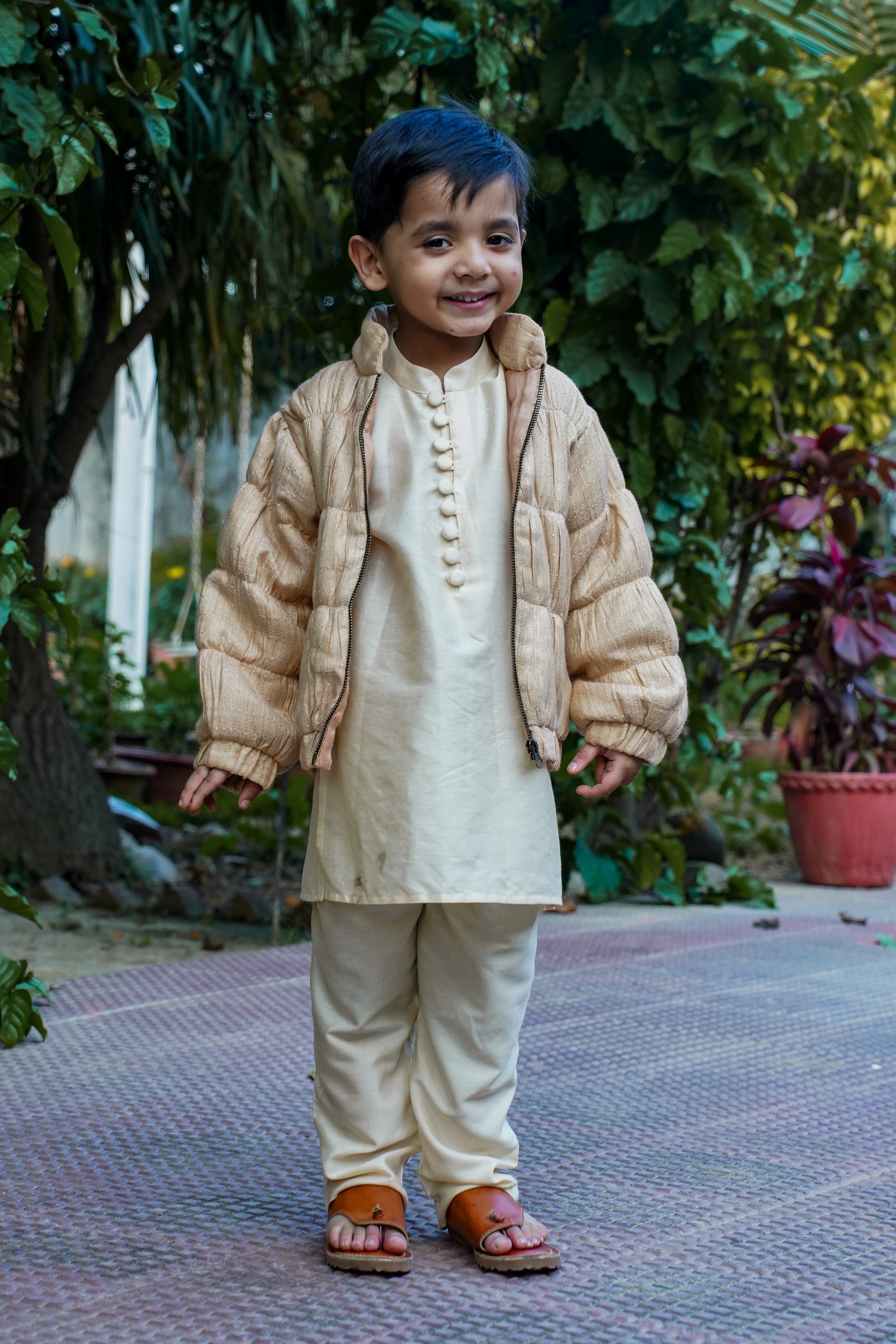 Kids ethnic wear: Kurta pajama with jacket, featuring trendy designs for weddings and formal events, ideal for children's fashion.