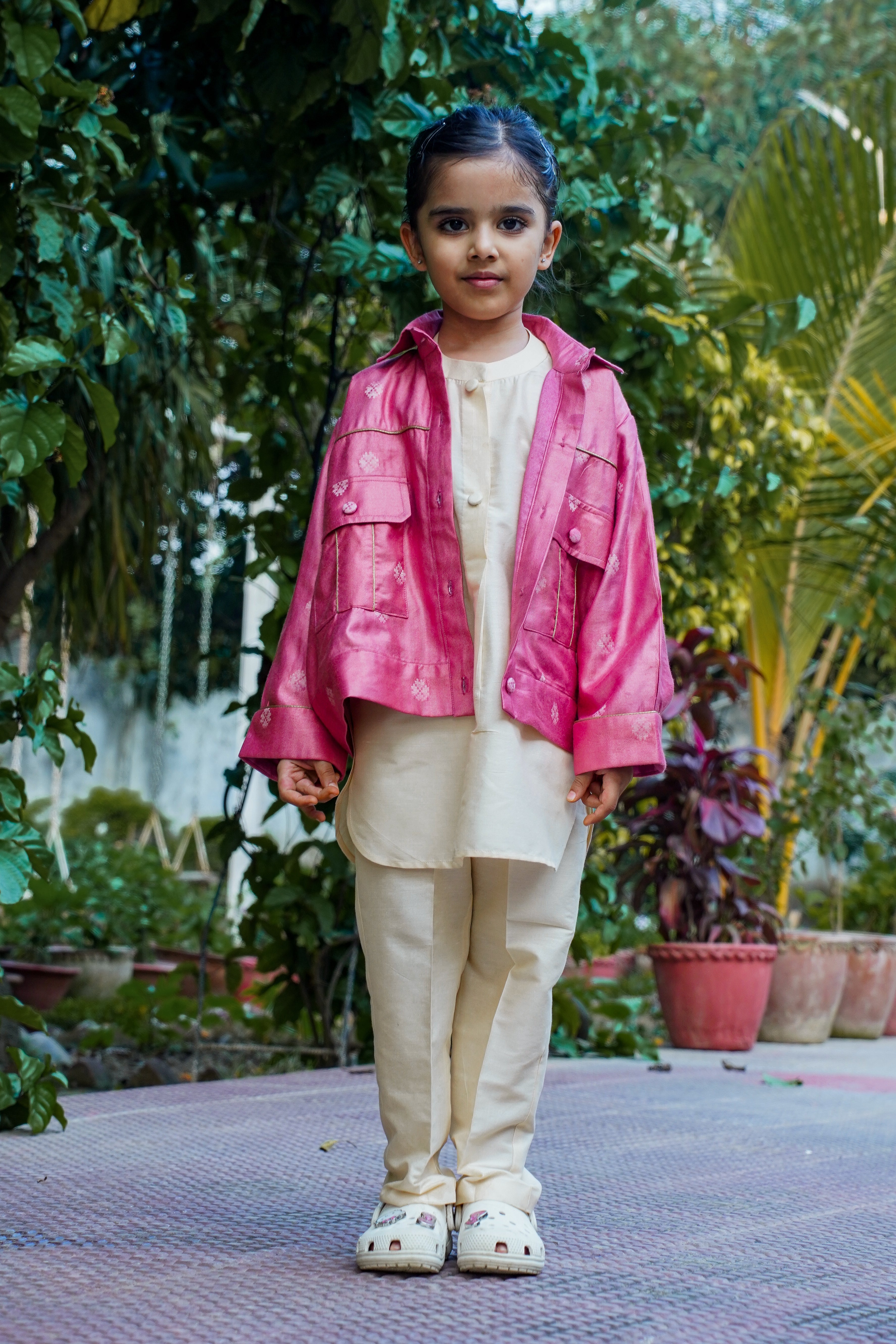 Bollywood-inspired kids' kurta pajama with jacket, perfect for ethnic events and weddings, showcasing traditional elegance and style.